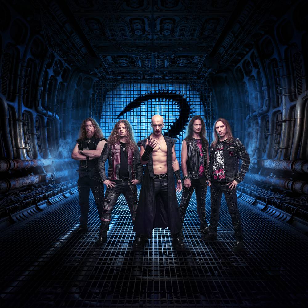 Beast In Black band photo in a sci-fi corridor