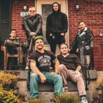 Belushi Speed Ball band photo on a front porch