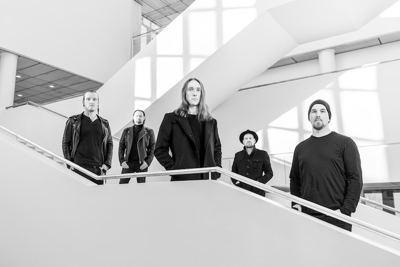 Endless Chain band photo on a white staircase